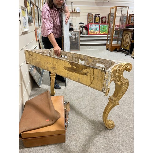 1020 - A 19th century French Rococo style console table, carved and scrolled giltwood frame with original m... 