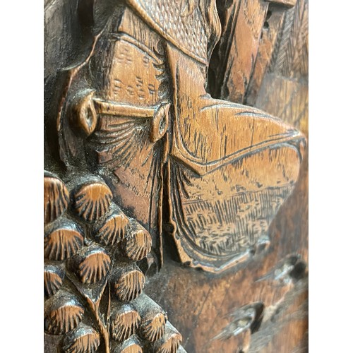 1117 - A pair of Chinese relief carved hardwood panels, 50cm x 20cm