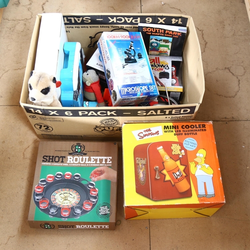 520 - A box of various toys and games, including a Thomas The Tank Engine carry case with various locomoti... 