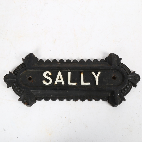 528 - A cast-iron plaque, 