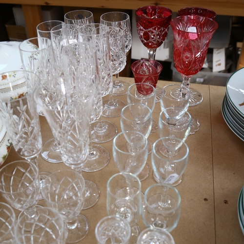 533 - Cranberry overlay wine goblets, tallest 22cm, various Champagne flues, liqueurs etc