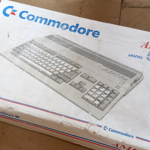 521 - Commodore Amiga Model 500, boxed, keyboard, power pack and instructions