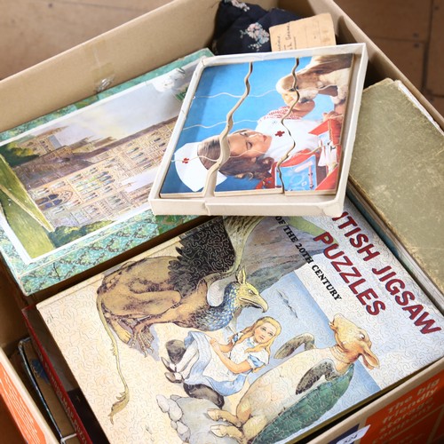 524 - A large selection of Vintage jigsaw puzzles