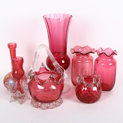 582 - A group of Vintage and later cranberry glassware, including a Webb's vase with frilled edge, basket ... 