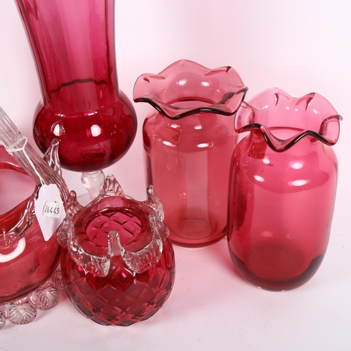 582 - A group of Vintage and later cranberry glassware, including a Webb's vase with frilled edge, basket ... 