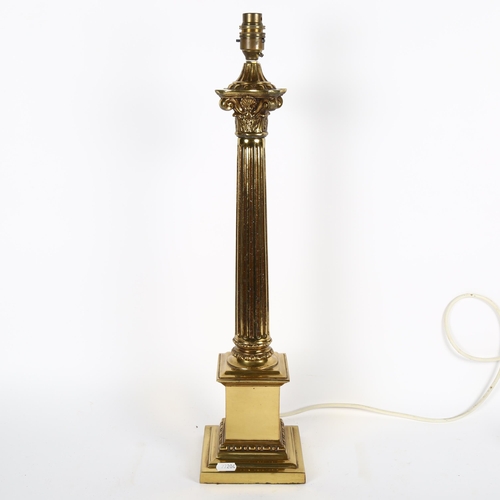 591 - A gilt-metal Corinthian column style table lamp, 59cm overall