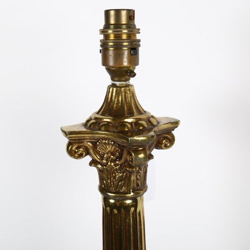 591 - A gilt-metal Corinthian column style table lamp, 59cm overall