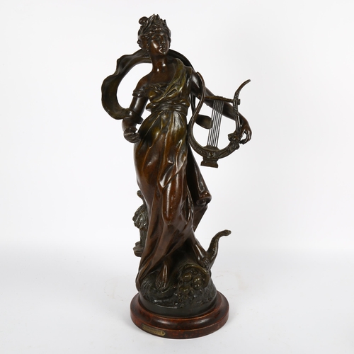 605 - After Louis Moreau, an Art Nouveau patinated spelter sculpture, 