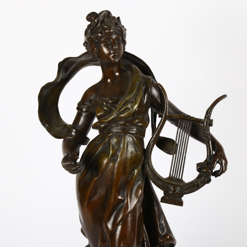 605 - After Louis Moreau, an Art Nouveau patinated spelter sculpture, 