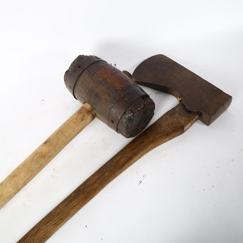 121 - A large Vintage 2-handed mallet, and a hand-forged iron woodsman's lopping axe stamped AL, length 88... 