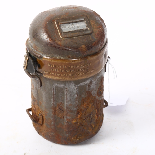 127 - A First World War Period French gas mask canister, height 16cm