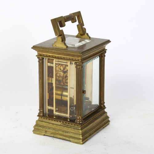 130 - JOSEPH GK & CAIRMS - a brass-cased 8-day carriage clock, with bevelled-glass panels and reeded colum... 