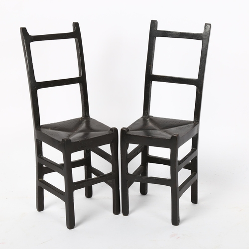 131 - A pair of patinated bronze miniature dining chairs, height 19cm