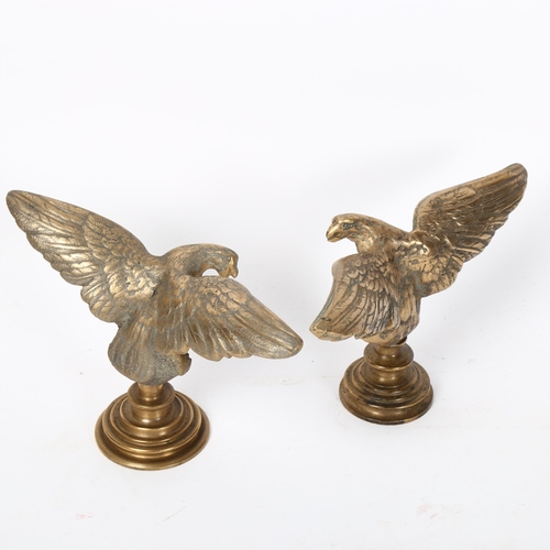 132 - An opposing pair of cast-bronze eagle figures, wingspan 18cm