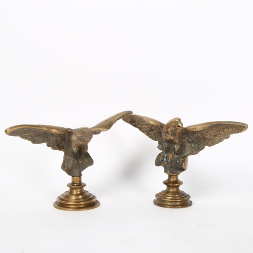 132 - An opposing pair of cast-bronze eagle figures, wingspan 18cm