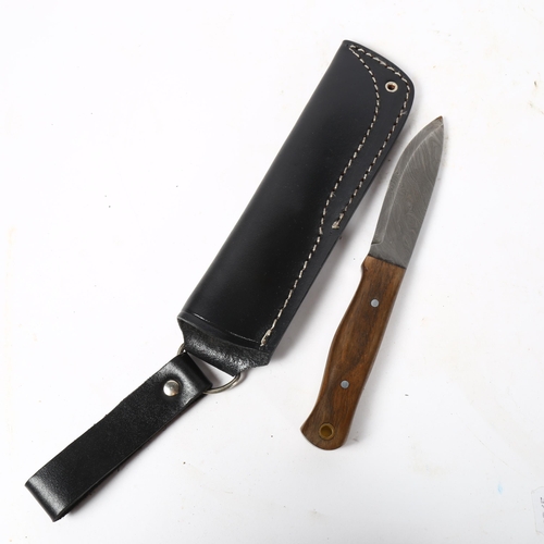 141 - A hunting knife with Damascus steel blade, and leather scabbard, blade length 10cm