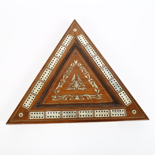 15 - A Victorian rosewood and mother-of-pearl inlaid triangular cribbage board, the underside of board wi... 