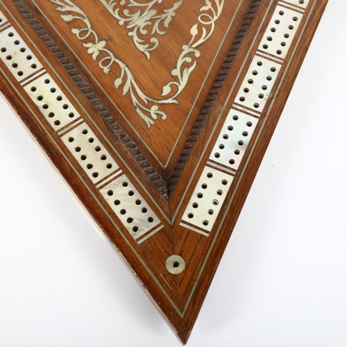 15 - A Victorian rosewood and mother-of-pearl inlaid triangular cribbage board, the underside of board wi... 