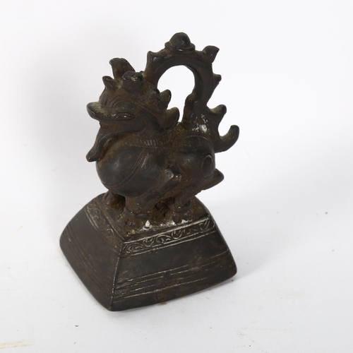 157 - A Burmese bronze opium weight, height 11cm