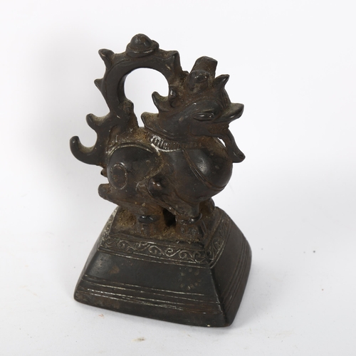 157 - A Burmese bronze opium weight, height 11cm