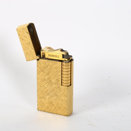 176 - A Vintage gold plated Dunhill London lighter