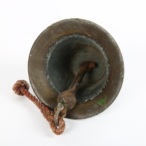 18 - A heavy bronze bell, unmarked, diameter 26cm, height 26cm
