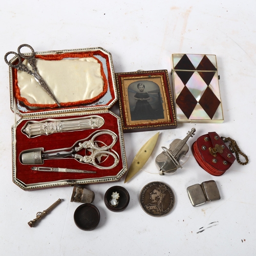 185 - A Victorian mother-of-pearl and tortoiseshell card case, a Victorian silver crown, a small Tunbridge... 