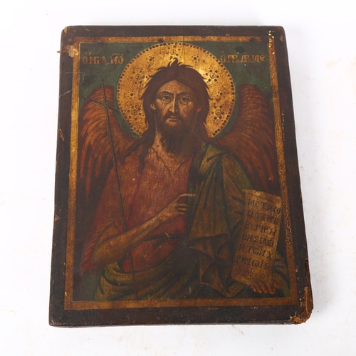 199 - A painted wood icon depicting St John The Baptist, length 24cm