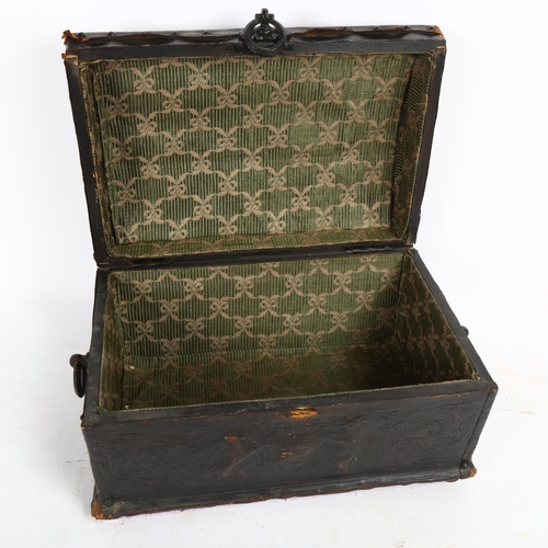 211 - A Black Forest leather-covered dome-top box, with embossed decoration and armorial crest, W34cm