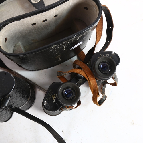 214 - A pair of Tecnar by Swift 8x30 binoculars, serial no. 15445, cased, and a pair of Zenith 10x50 binoc... 