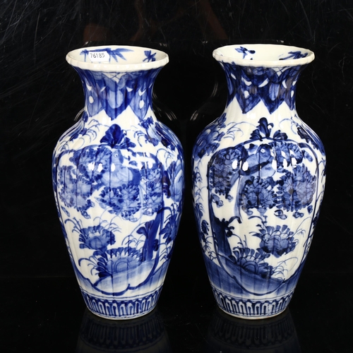 222 - A pair of Chinese blue and white baluster vases, height 30cm