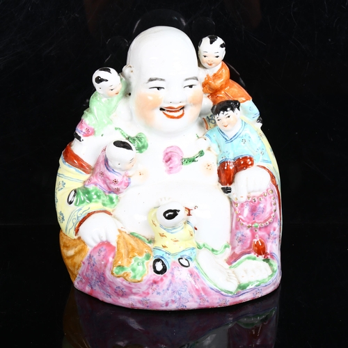 224 - A Chinese famille rose laughing Buddha, with 5 figures of children, height 26cm