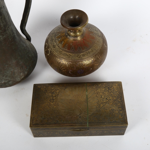 23 - A Turkish brass wine ewer, engraved brass peacock cigarette box, and vase, height 13cm (3)