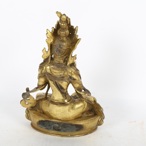 239 - A polished bronze stone set seated Buddha, on lotus base, height 22cm