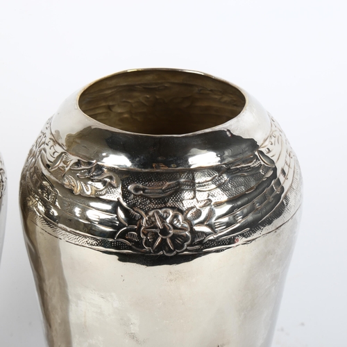 29 - A pair of Art Nouveau silver plated vases, height 22cm