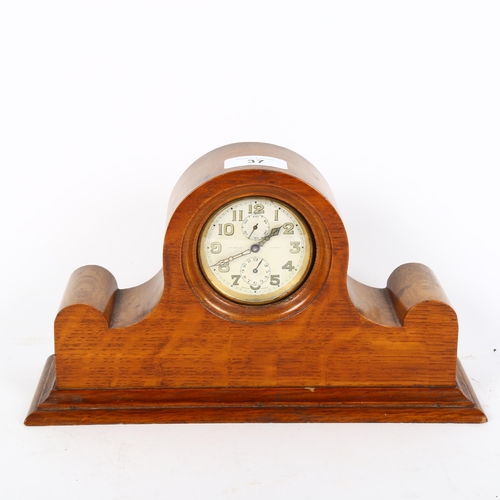 37 - J W BENSON - an early 20th century light oak drum alarm mantel clock, Arabic numerals with subsidiar... 