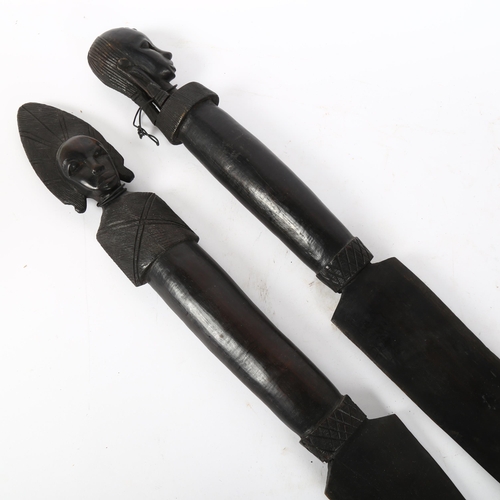 50 - A pair of African Tribal decorative swords, length 92cm