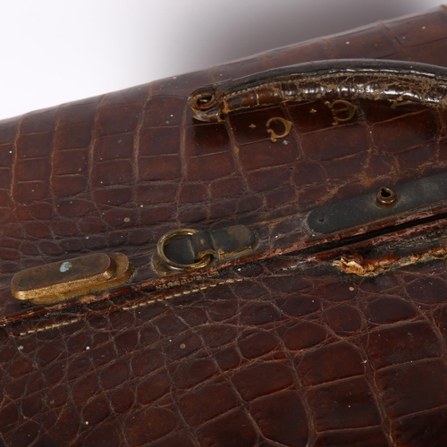 64 - HARRODS - an Antique crocodile skin Gladstone bag, W40cm, H20cm, D26cm