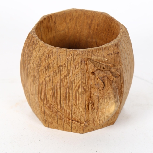 73 - ROBERT MOUSEMAN THOMPSON - an oak napkin ring, with carved mouse, diameter 5cm, height 5cm