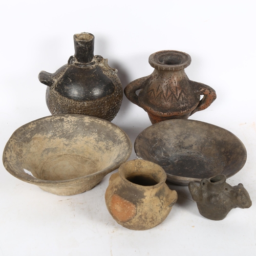 248 - A group of African pottery, to include 2 vessels, 2 bowls, a small pot etc (6)