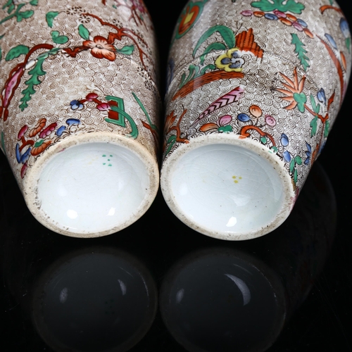 251 - A pair of 19th century chinoiserie transfer printed vases with gilded neck handles, no factory marks... 