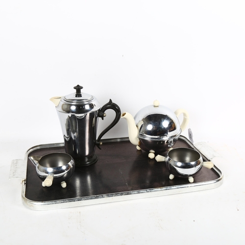 270 - Chrome and ceramic heater saver 1950s tea set, to include tray