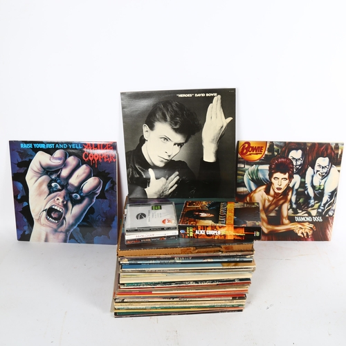 271 - A quantity of vinyl LPs and records, to include Alice Cooper, David Bowie, and The Partridge Family,... 