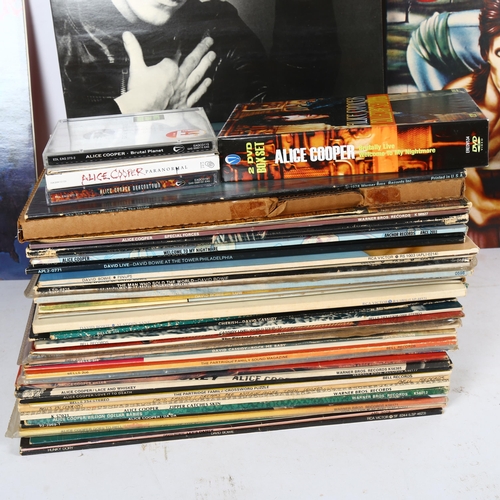 271 - A quantity of vinyl LPs and records, to include Alice Cooper, David Bowie, and The Partridge Family,... 