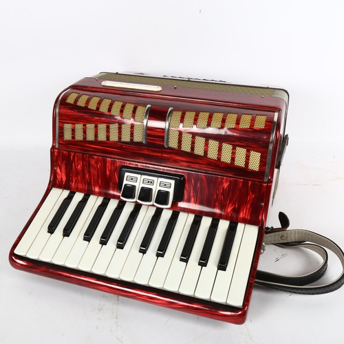 277 - A Lyra piano accordion, cased, various tutorial ephemera and music posters of Roy Wood and Wizard