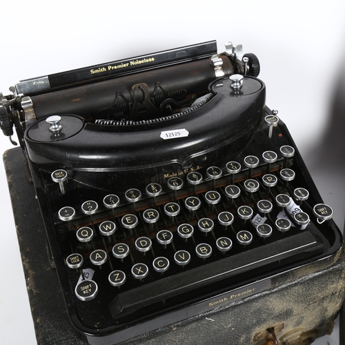 299 - A Smith Premier Noiseless typewriter with case, and an Adler Junior 10 typewriter, also with case