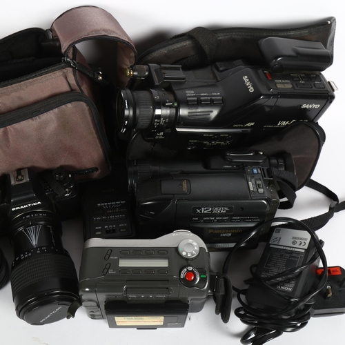 303 - Various Vintage cameras and hand-held video recorders, including Sony, Panasonic, Praktica etc