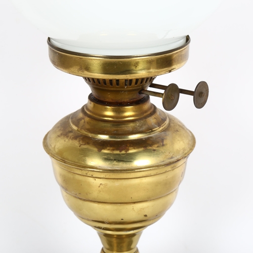 326 - Antique brass oil lamp with chimney and shade, 50cm