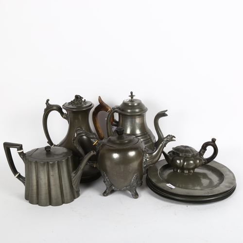 327 - Pewter teapot, height 18cm, another with fluted decoration, 2 coffee pots, 5 pewter plates (4 with t... 