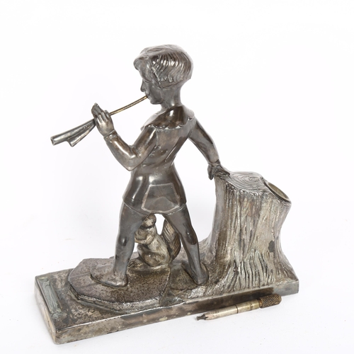 342 - A patinated spelter desk-top Vesta, modelled as a boy and squirrel, height 18cm